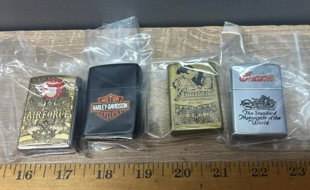 4 Collector Cigarette Lighters. #DC