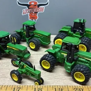 5, 1:64 John Deere Tractors.
