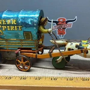 Battery Operated Pioneer Spirit Tin Toy Wagon.