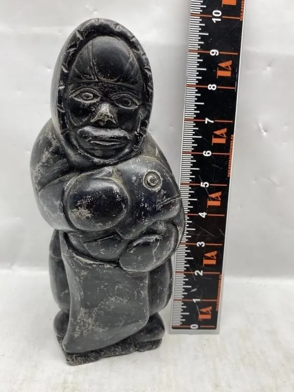 Inuit Soapstone Carving of Woman Holding Fish