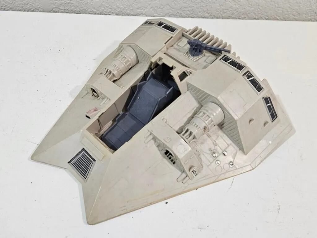 Vintage Sci-Fi Toy Vehicle with Blaster