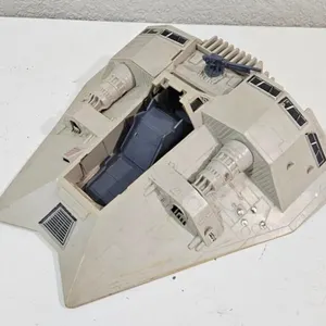 Vintage Sci-Fi Toy Vehicle with Blaster