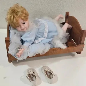 Doll in Wooden Rocking Cradle w/ Shoes