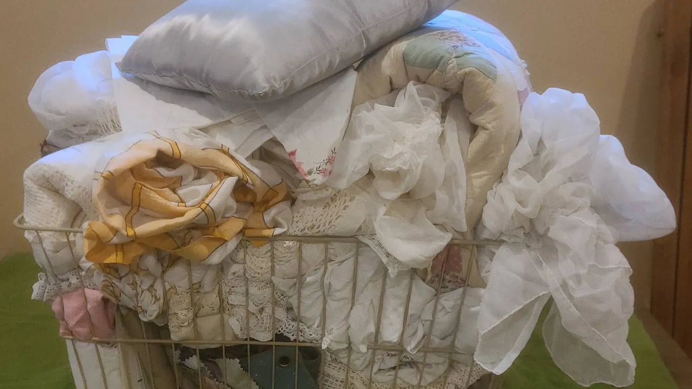 Basket of Assorted Linens, Quilts, Pillow, and Textiles