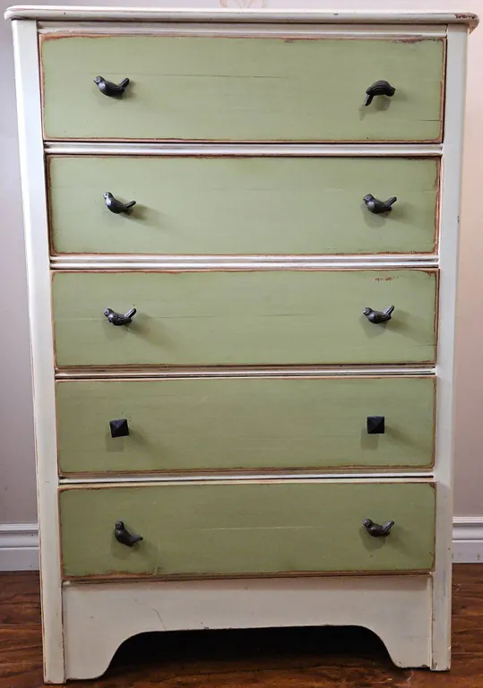 Green and Cream Painted Dresser with Bird Pulls, Floor Lamp, and Patchwork Quilt