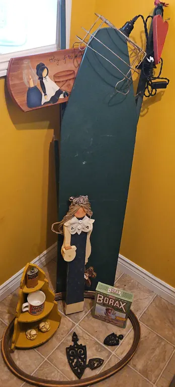 Home Decor Items Including Painted Ironing Board, Wire Lamp Shade, Wall Art, and Collectibles