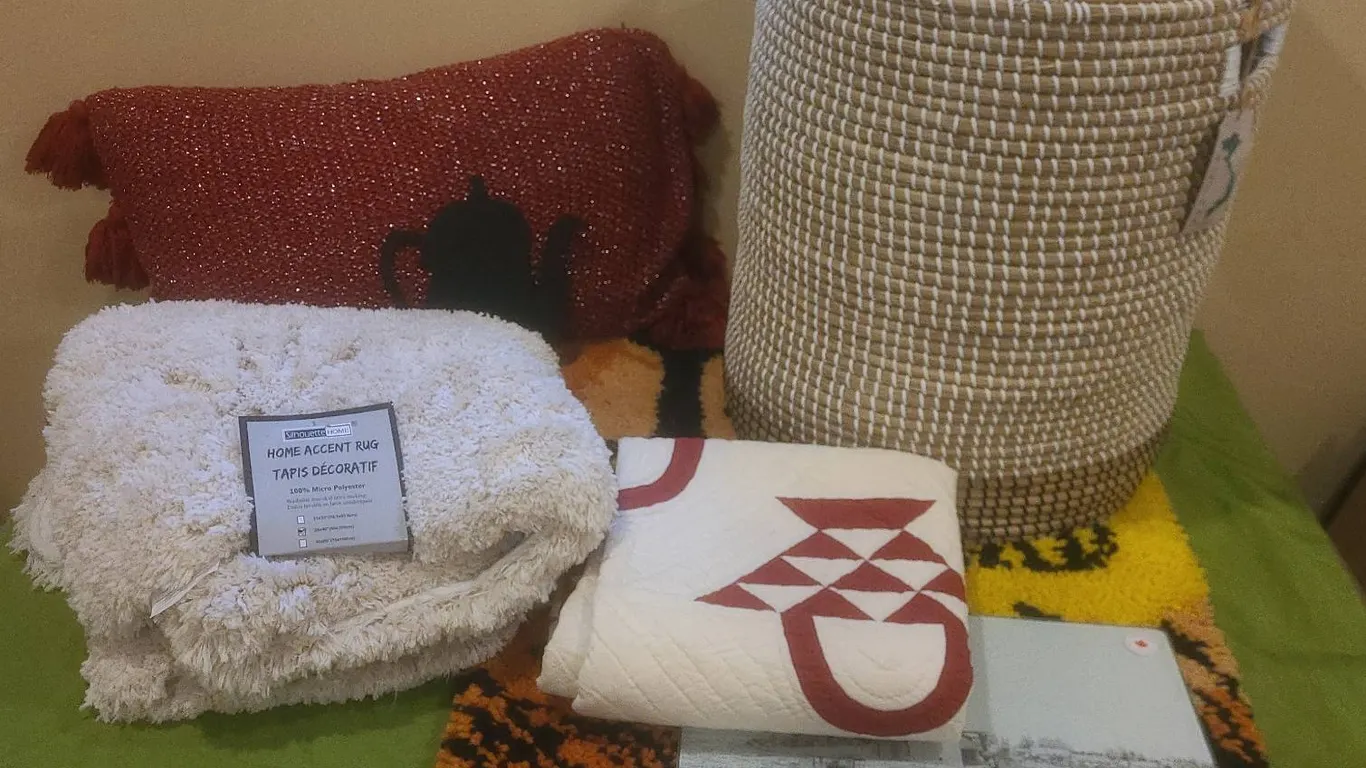 Home Décor Lot With Basket, Rugs, Pillow, Quilt, and Art