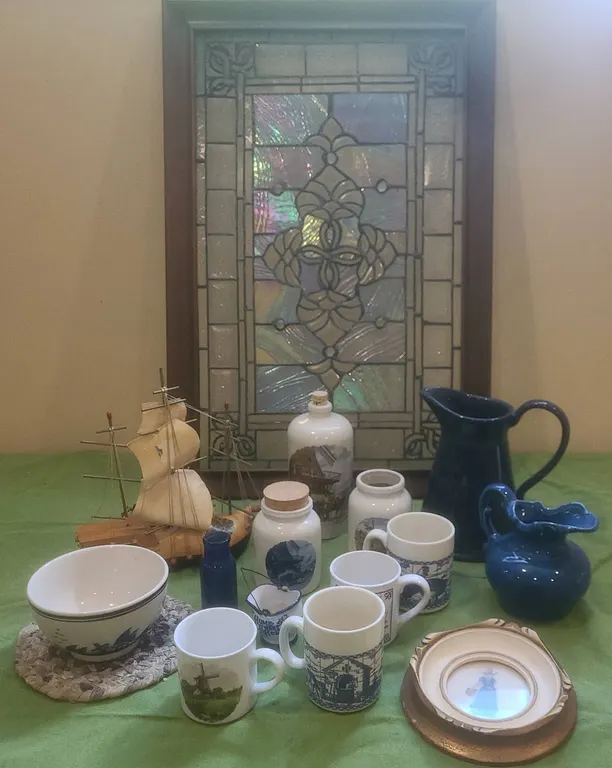 Lot: Dutch Ceramic Decor, Wooden Ship Lamp, Framed Stained Glass Panel