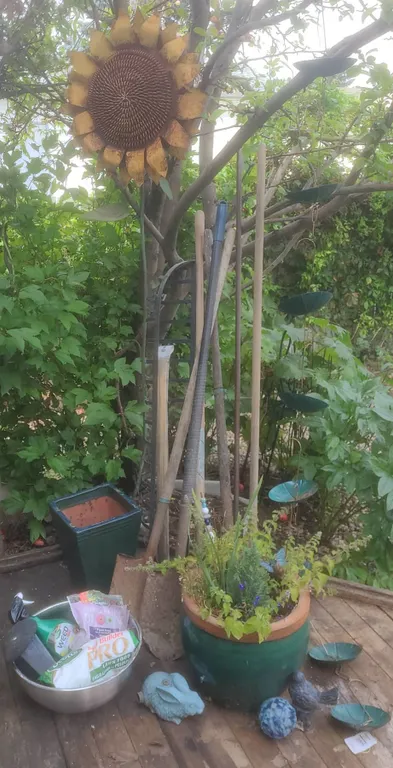 Garden Decor and Tool Lot Including Umbrella Rain Chain and Metal Sunflower