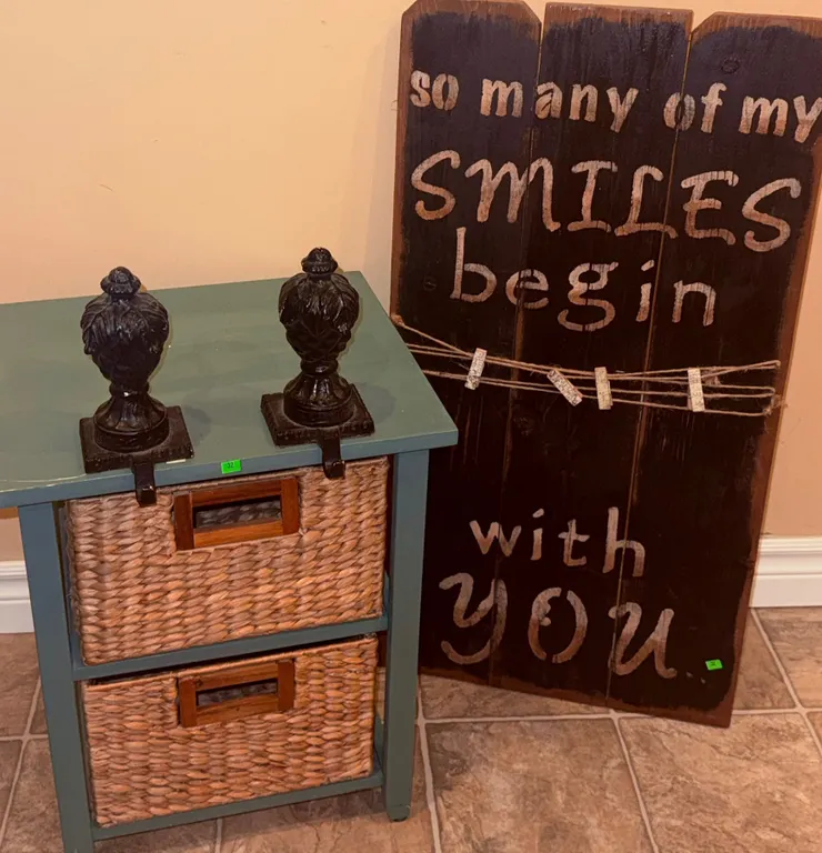 Decorative Lot: Wood Wall Sign, Wicker Drawer Stand, Cast Iron Finials