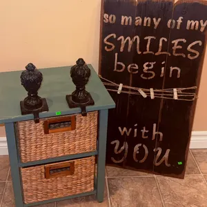 Decorative Lot: Wood Wall Sign, Wicker Drawer Stand, Cast Iron Finials