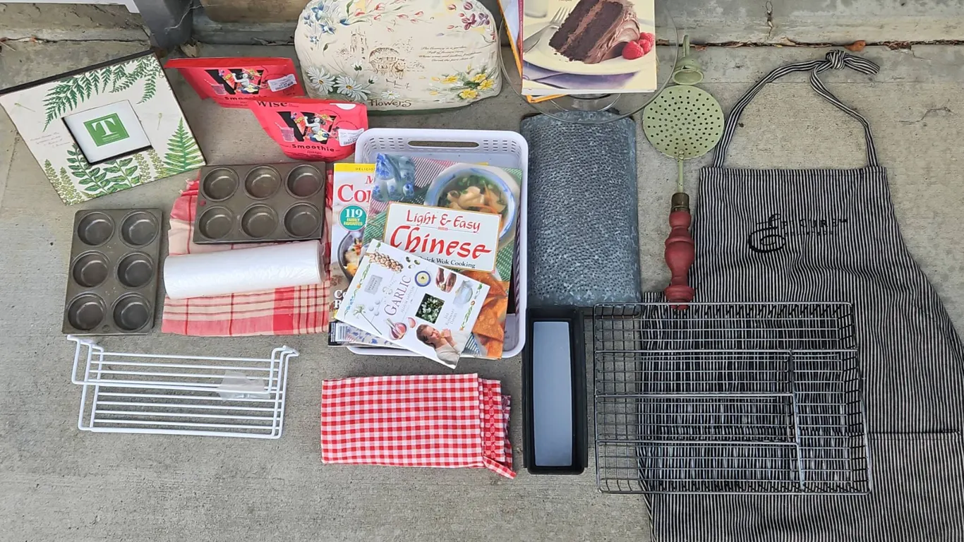 Kitchen Lot With Cookbooks, Bakeware, Apron, and Kitchenwares