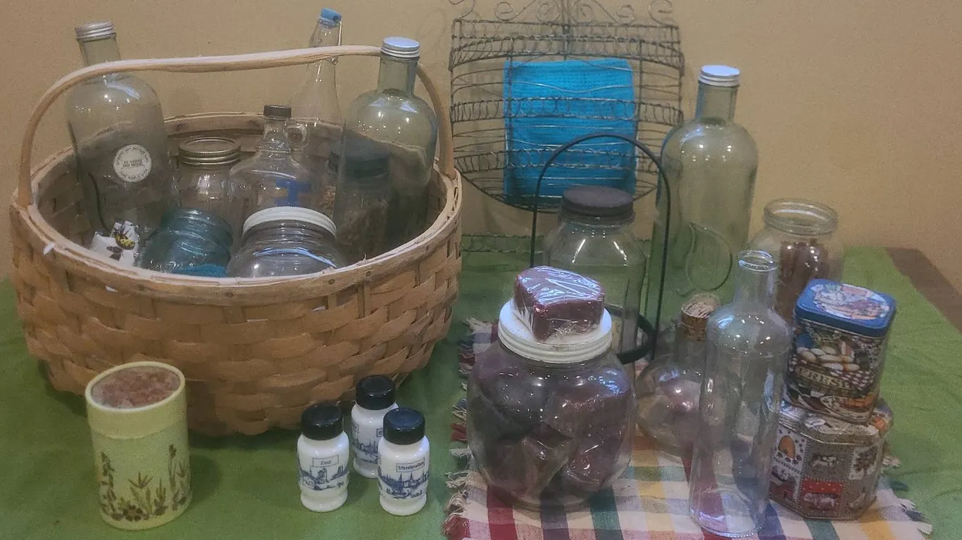 Kitchen Storage Lot With Glass Bottles Jars Baskets And Tins