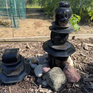 Stacked Black Lacquer Ornamental Garden Sculpture With Crane Motif