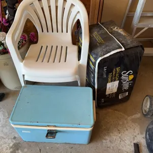 Sunshine 3.8 cu ft Sphagnum Peat Moss, White Plastic Chair, and Blue Cooler