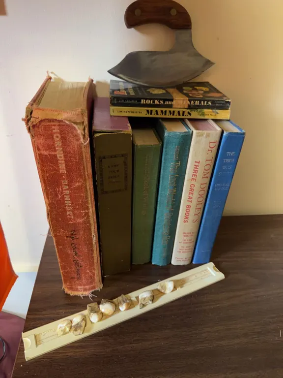 Book Lot With Rock Guide, Ulu Knife, and Teeth