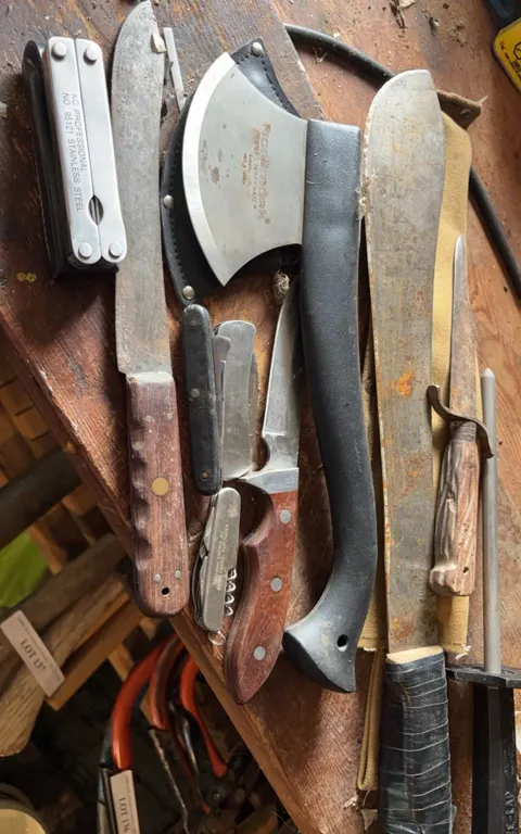 Knife and Tool Lot Featuring Normark Hatchet