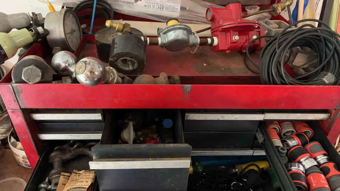 Toolbox With Hose Fittings, Clamps, and Miscellaneous Items