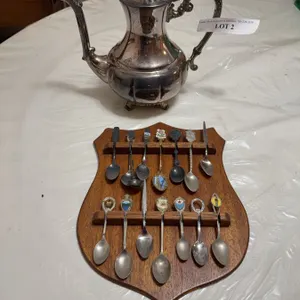 Silver-Plated Teapot and Collector Spoons on Plaque