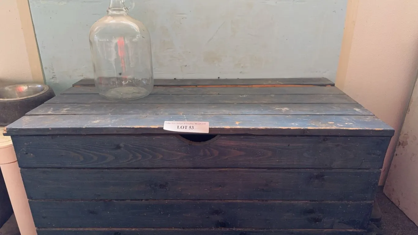 Wooden Storage Chest and Glass Jug