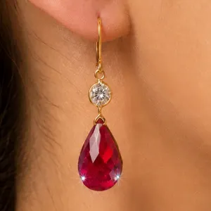 10k(1.7g), Ruby (7ct) Earring Retail value $1600
