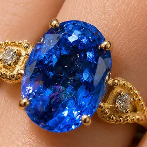 10k(2.3g), Tanzanite (3.3ct), Lab Diamond (0.03ct) Ring, Size 7 : Retail Value $2400