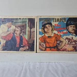 Charlie Chan's Secret & Shirley Temple Posters - discoloration to paper
