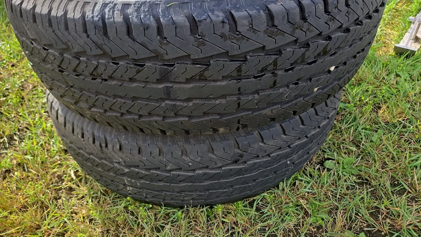2 - Goodyear P235/75R15 tires - will pass safety