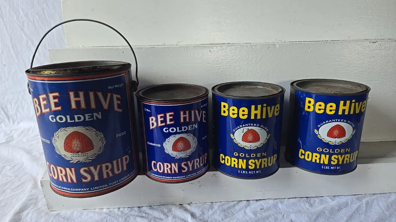 4 - Bee Hive Syrup Cans, 5lb. (3) & 10lb. (1)