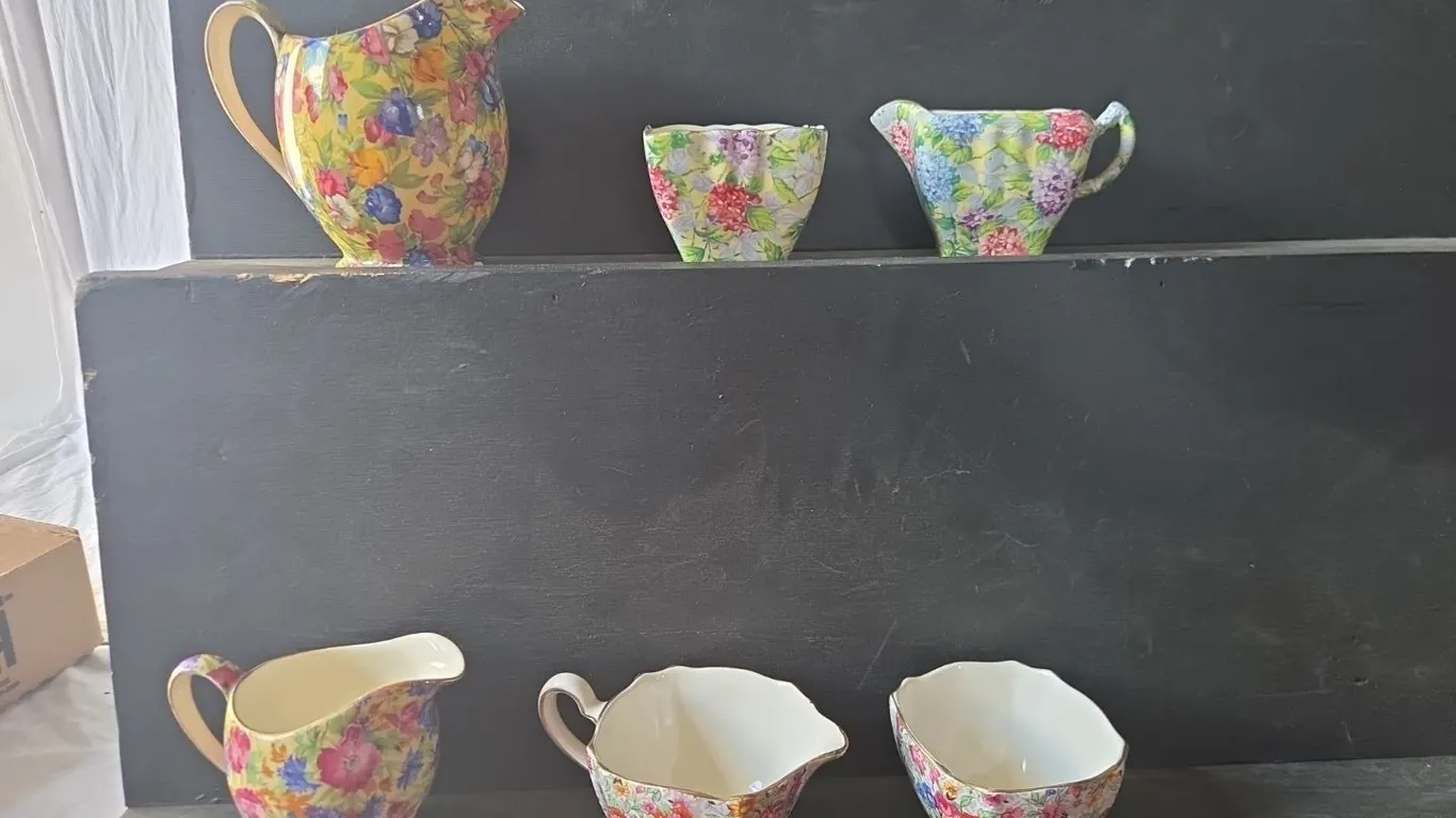 Chintz Cream & Sugars, lg. pitcher is chipped