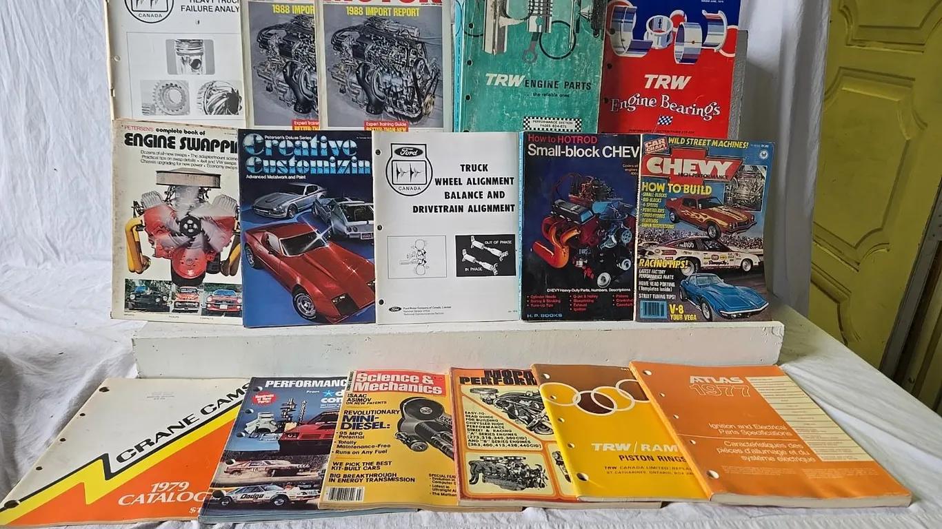 Various auto manuals & parts books