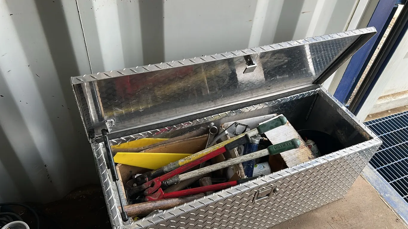Checkerplate Toolbox Full of Assorted Tools