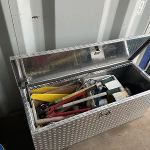 Checkerplate Toolbox Full of Assorted Tools