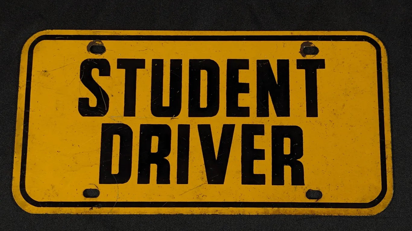 TIN BOOST LICENSE PLATE SIGN STUDENT DRIVER