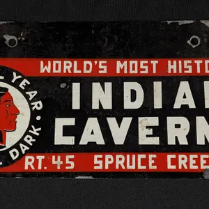 TIN LICENSE PLATE TOPPER BOOSTER LICENSE PLATE SIGN WORLD'S MOST HISTORIC INDIAN CAVERNS RT 45 SPRUCE CREEK PA PENN PENNSYLVANIA