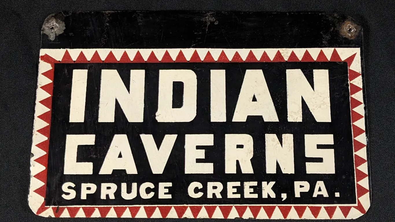 TIN LICENSE PLATE TOPPER BOOSTER PLATE SIGN INDIAN CAVERNS SPRUCE CREEK PA PENNSYLVANIA PENN