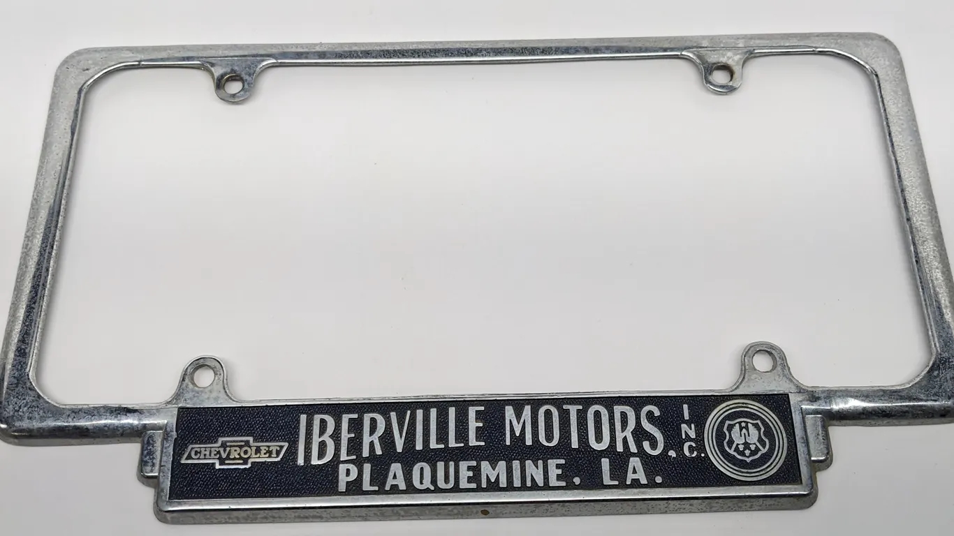 LICENSE PLATE FRAME IBERVILLE MOTORS INC CHEVROLET OLDSMOBILE PLAQUEMINE LA LOUISIANA