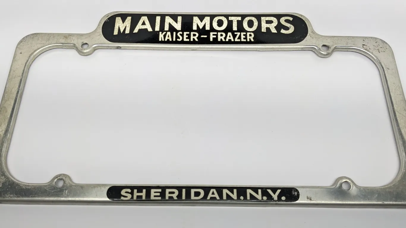 LICENSE PLATE FRAME MAIN MOTORS KAISER FRAZER SHERIDAN NEW YORK NY
