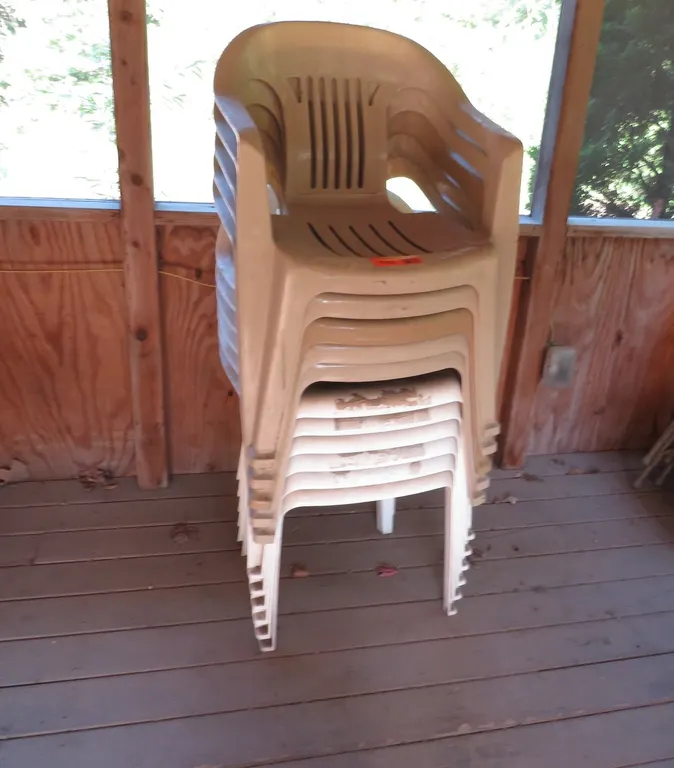 Stack of Plastic Outdoor Chairs