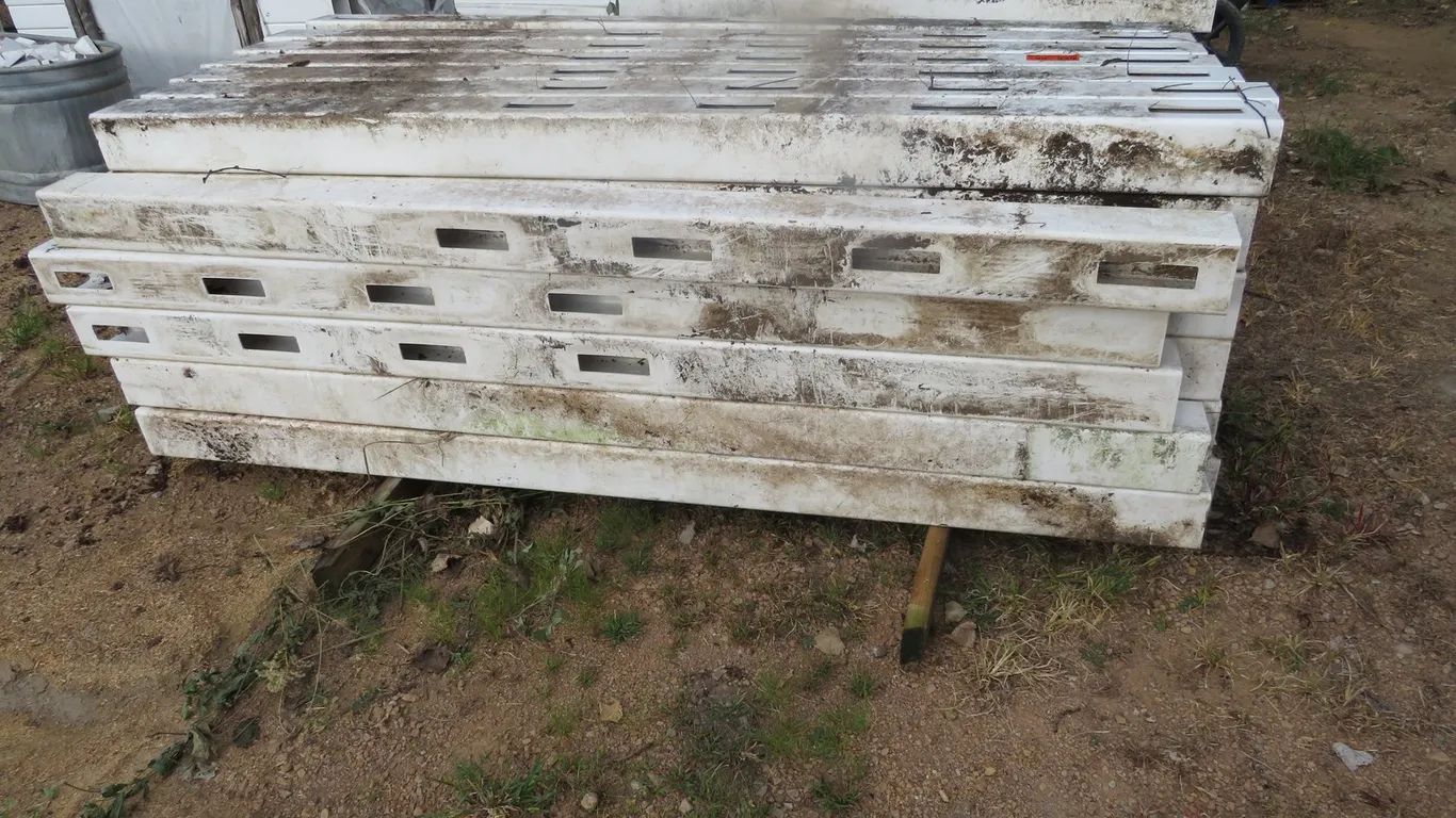 Approx. (52) New Plastic Fence Posts and (4) Rails