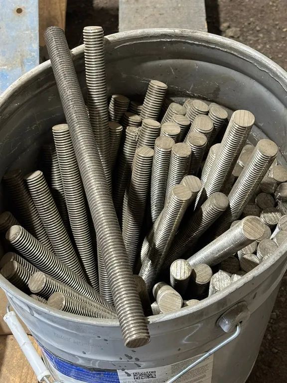 Bucket of Threaded Rods
