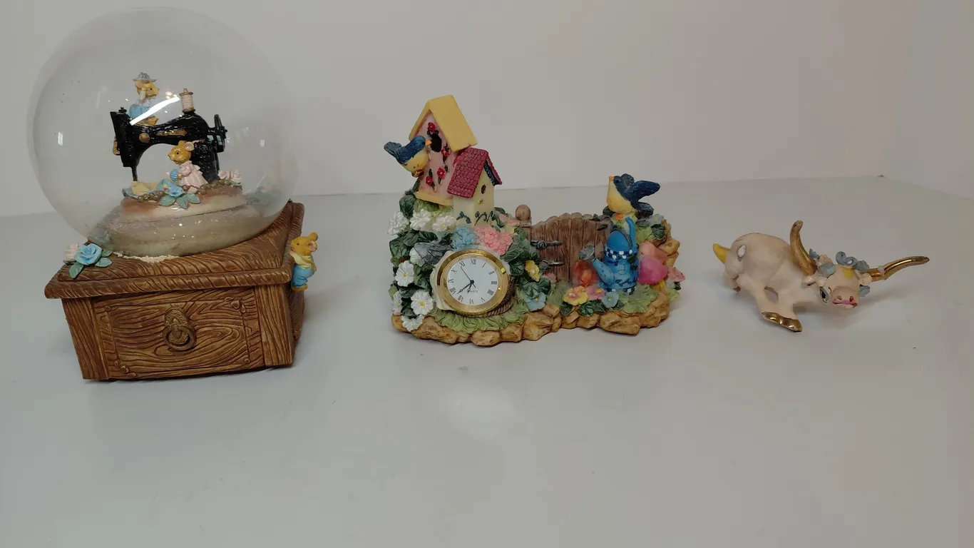 Snow Globe, Clock, And Vintage Cow