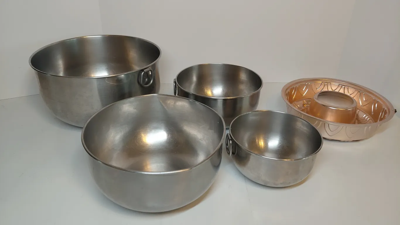 Stainless Steel Mixing Bowls And A Jell-O Mold