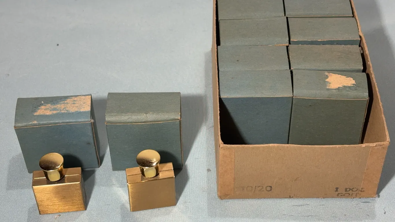 10 Perfume Bottles in Gold Tone Cases NIB