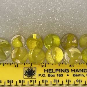 Yellow Cats Eye 10 Ct & 1 Shooter Marbles