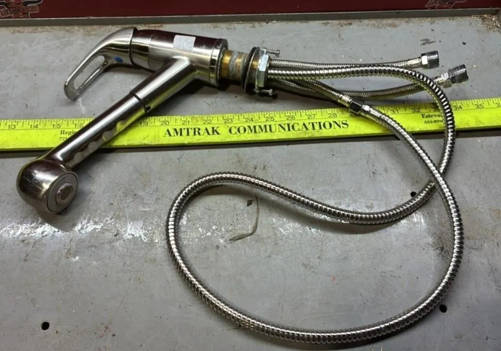 Used Pull Out Single Lever Kitchen Faucet.