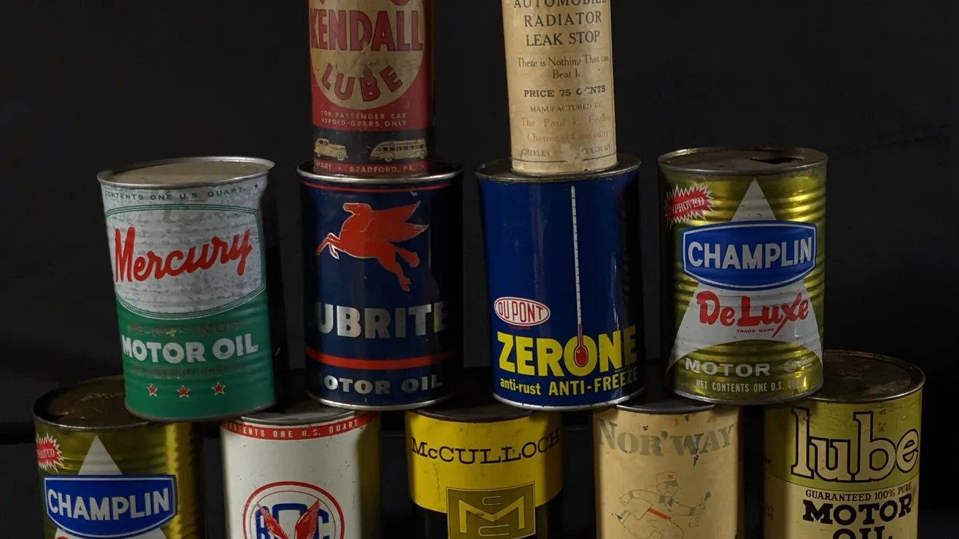 11 ASSORTED OIL & ANTIFREEZE CANS