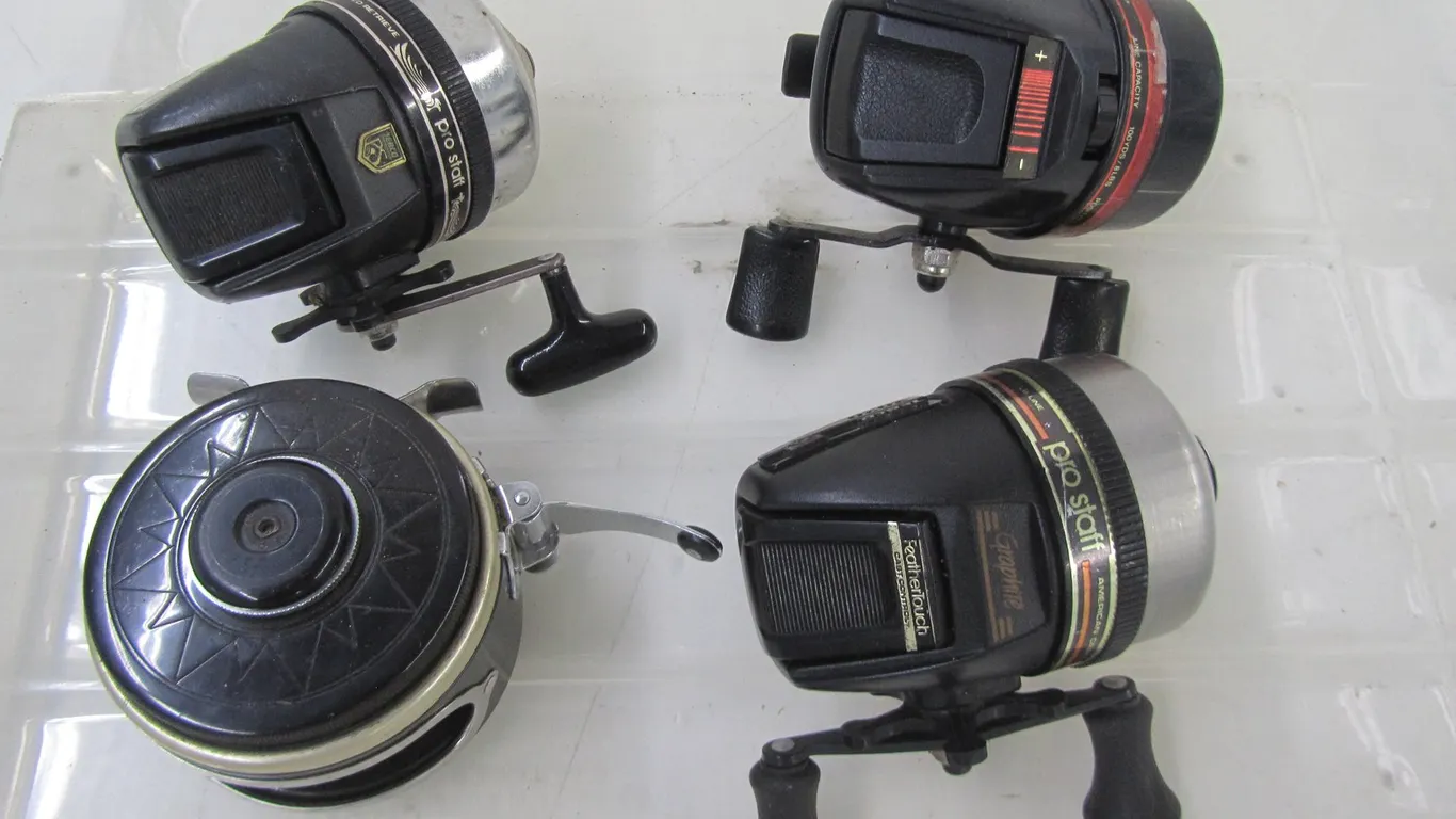 (4) Assorted Fishing Reels