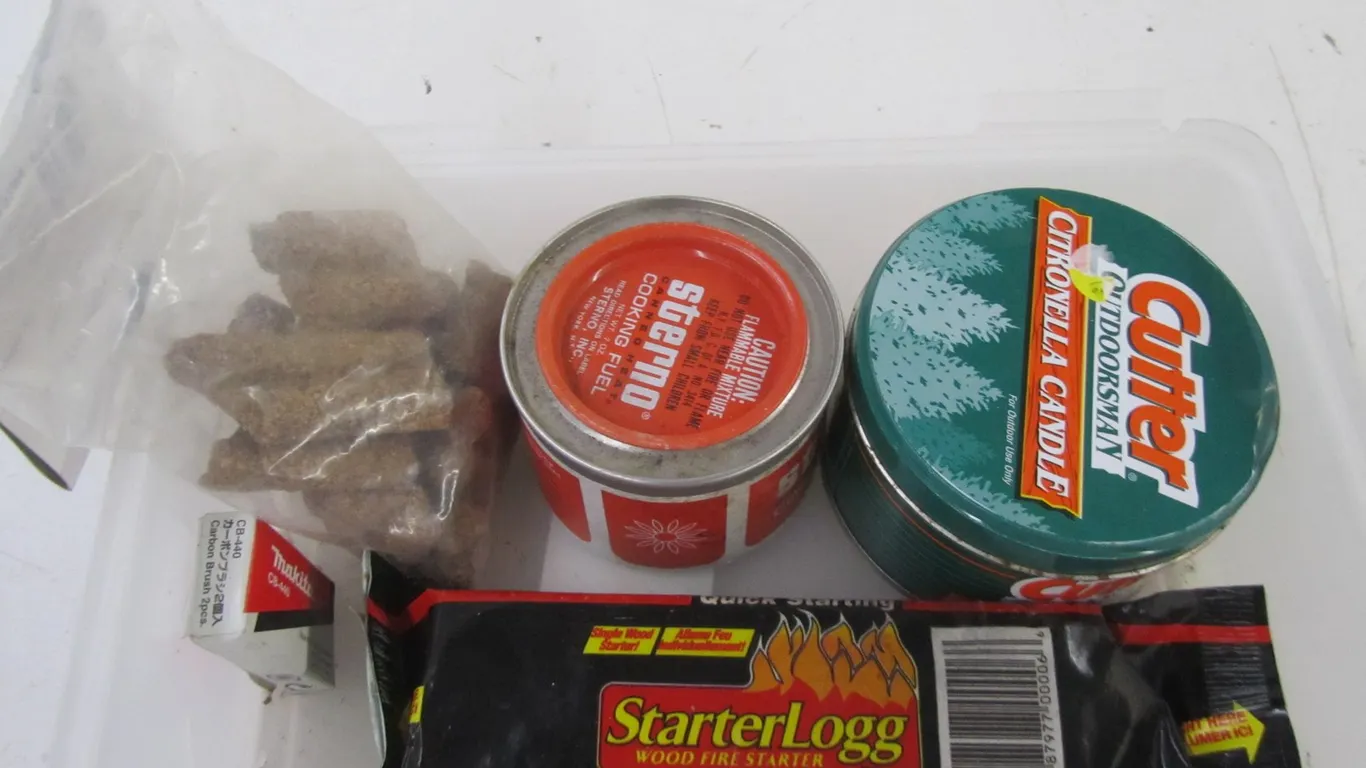 Wood Fire Starter Log, Sterno Cooking Fuel Can, Citronella Candle, And Ozark Trail 12pc. Fire Starter Kit