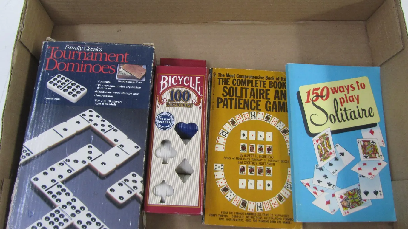 Dominoes Set, Poker Chips Set, And (2) Solitaire Books